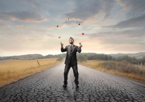 bigstock-Young-businessman-juggling-on-36379216